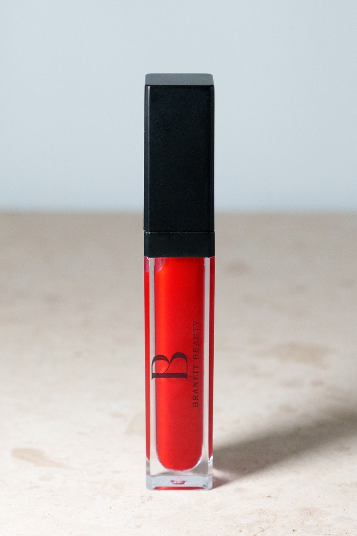 lip gloss with led light feature and mirror tinted and clear red