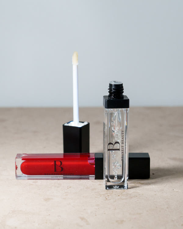 lip gloss with led light feature and mirror tinted and clear red
