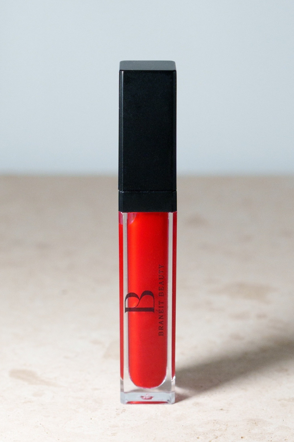 lip gloss with led light feature and mirror tinted and clear red