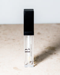 lip gloss with led light feature and mirror tinted and clear red