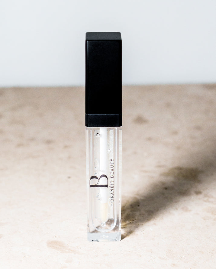 lip gloss with led light feature and mirror tinted and clear red